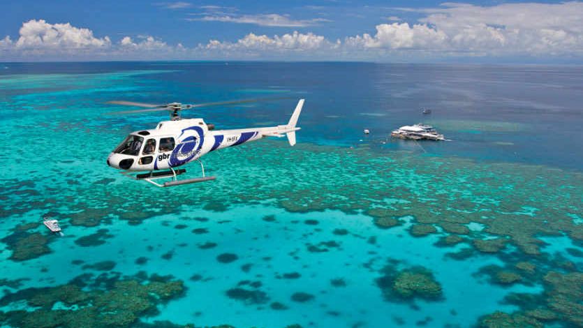 Great Barrier Reef scenic helicopter tour flying over coral cays from Port Douglas and Cairns