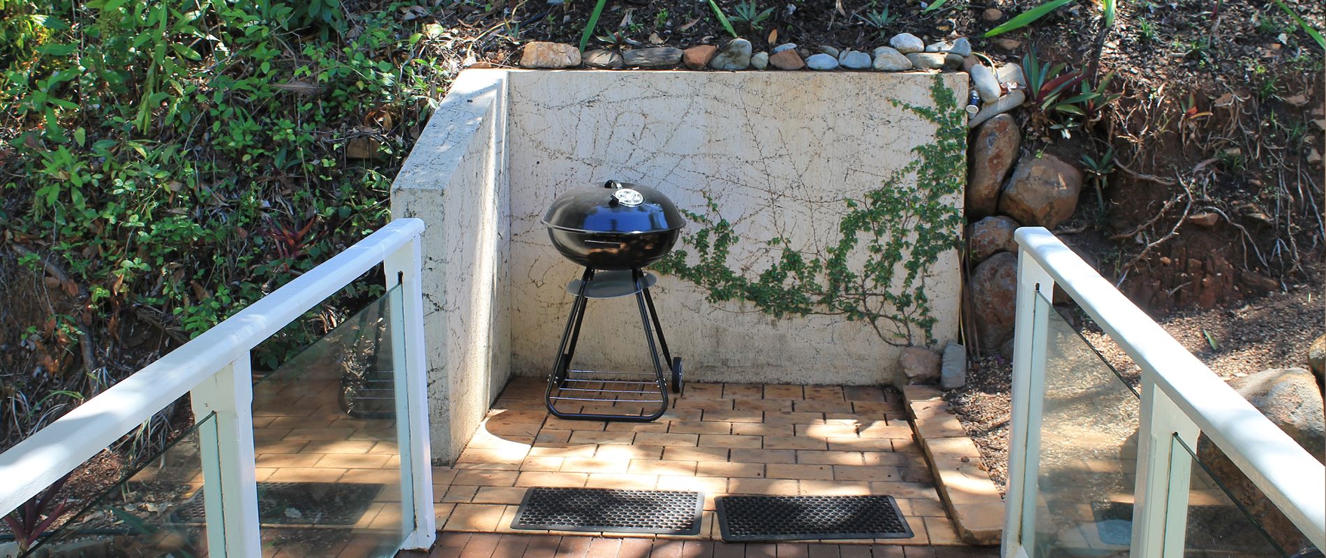 Outdoor BBQ facilities Outdoor kettle BBQ station supplied with cooking utensils and coal