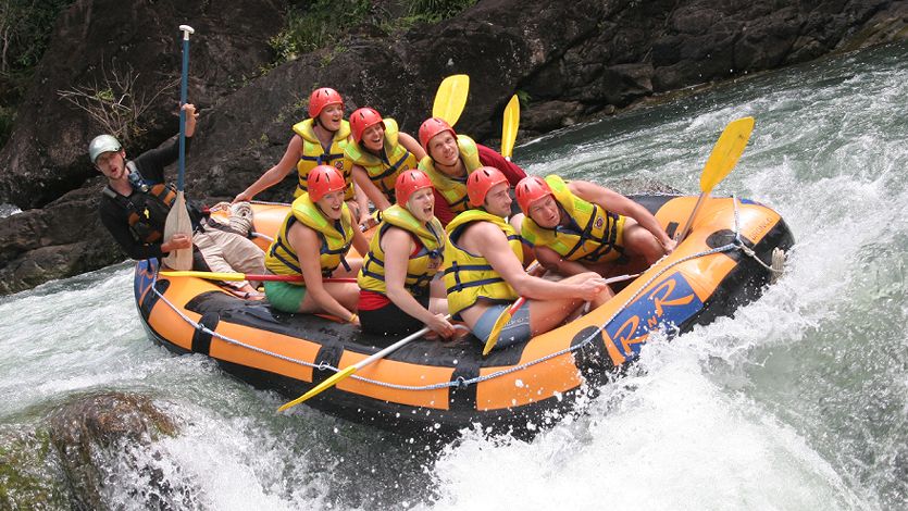 Action shot of white water rafting adventure tour on the Barron River near Cairns Queensland